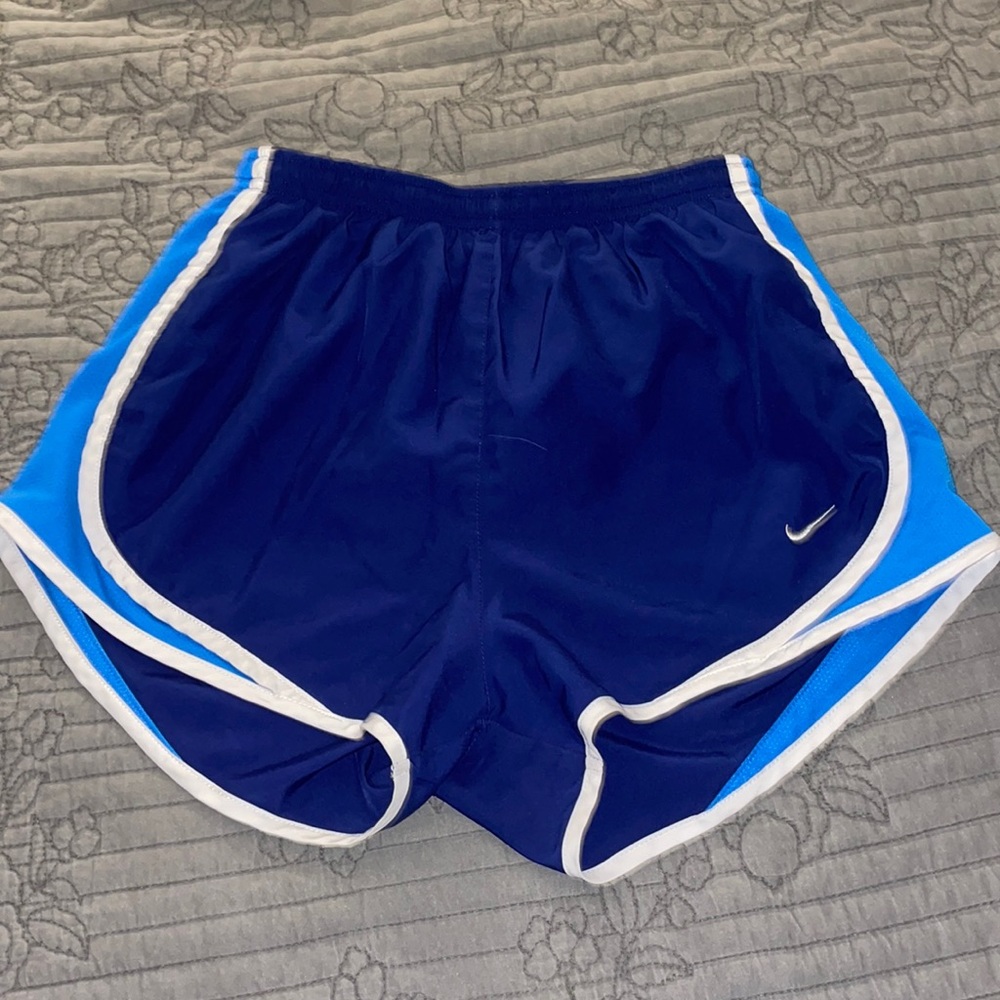 Blue Nike athletic shorts